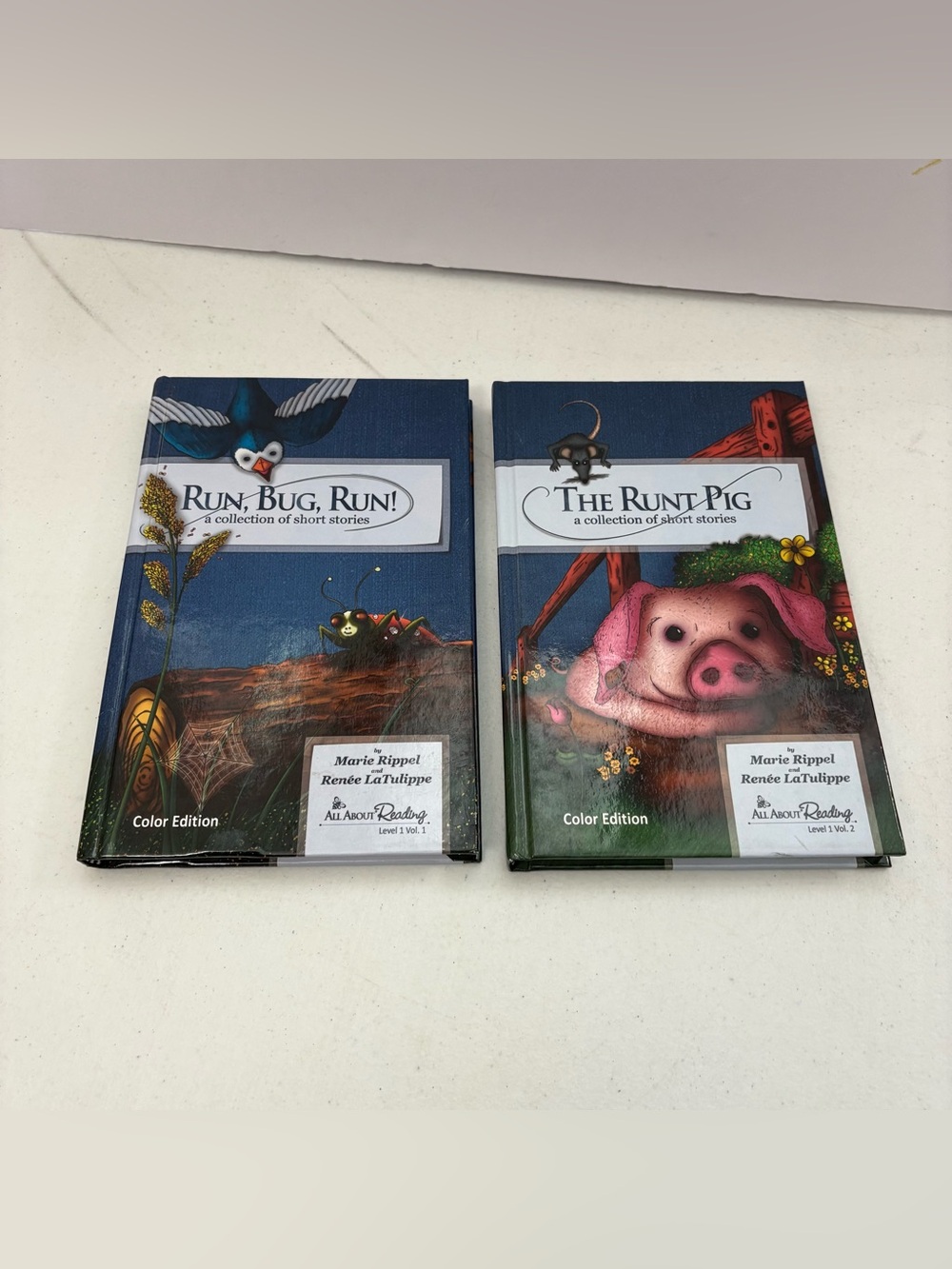 Lot of 2 ALL ABOUT READING Level 1 Readers Color Vol 1 & 2 Run Bug Run Runt Pig